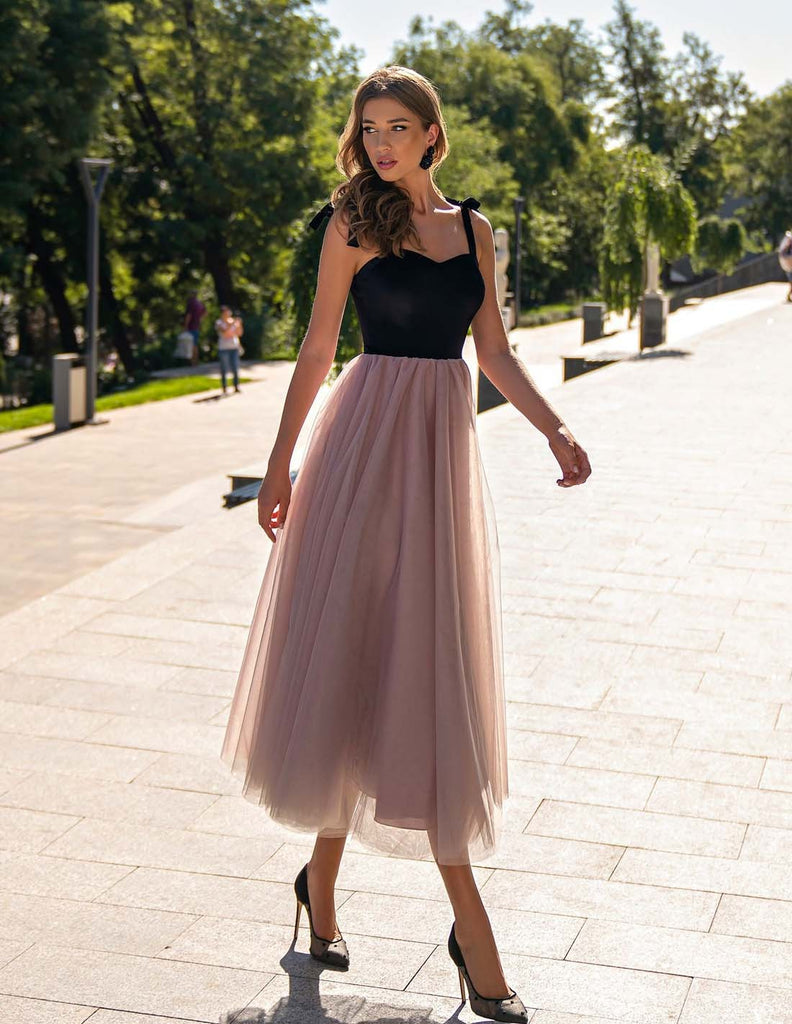 pink and black dress combination A black dress with hot pink accessories is *chef's kiss* Loving @molly.engelhardt1 killed this hoco look in Faviana S10900 #Faviana #CelebrateYourself